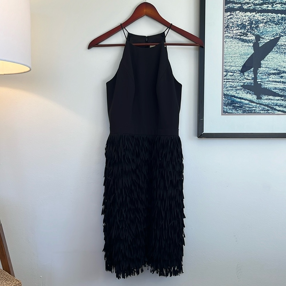 Black mini dress with textured bottom